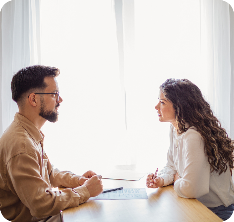 Couple talking in a bright room